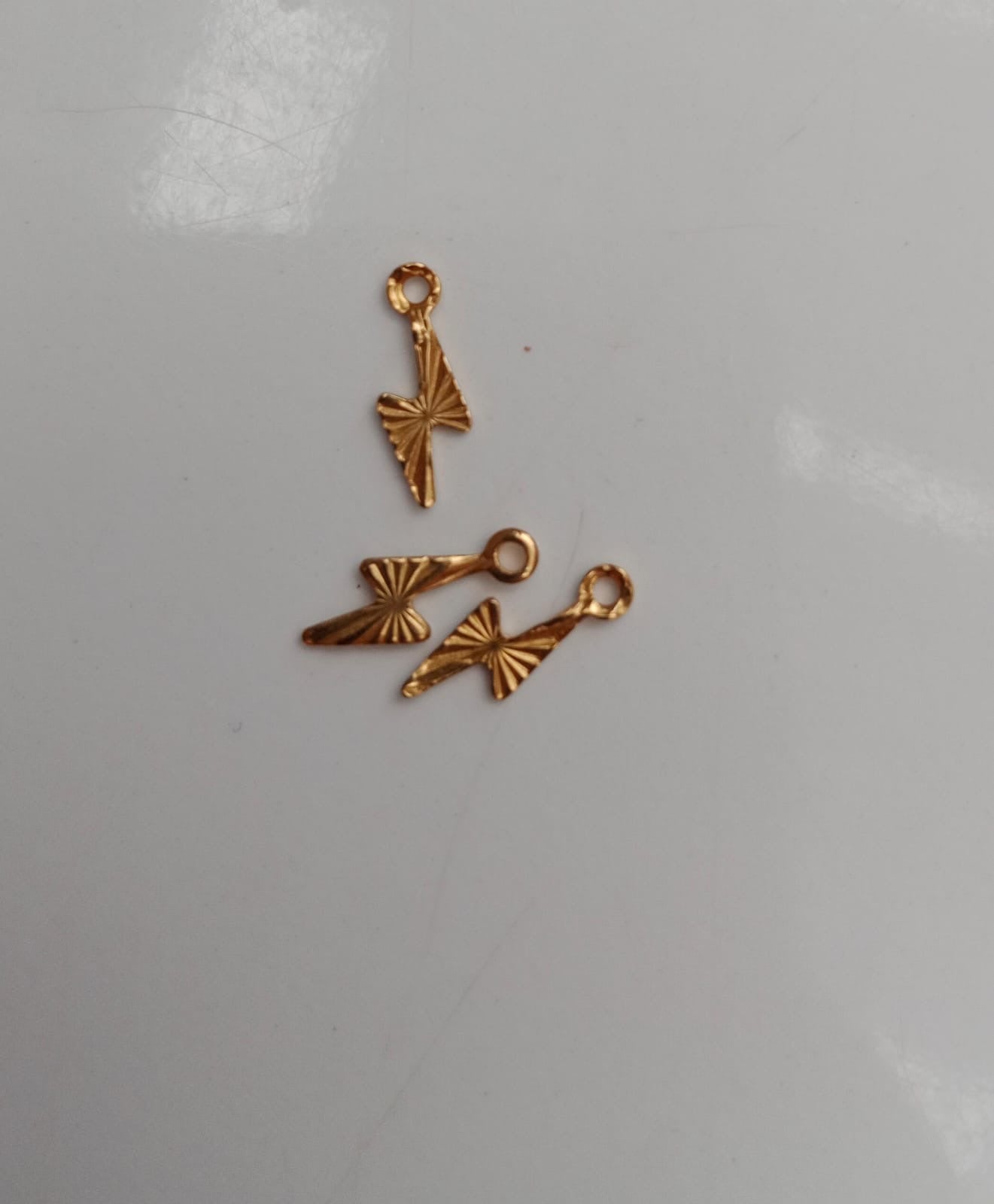 lightning gold charm