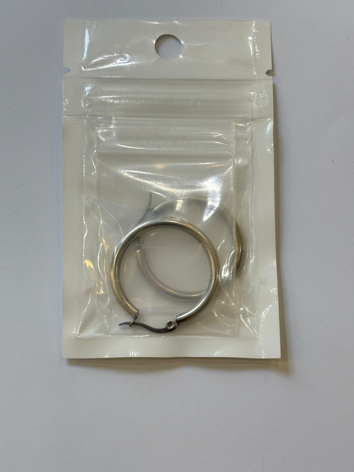 Classic silver hoops