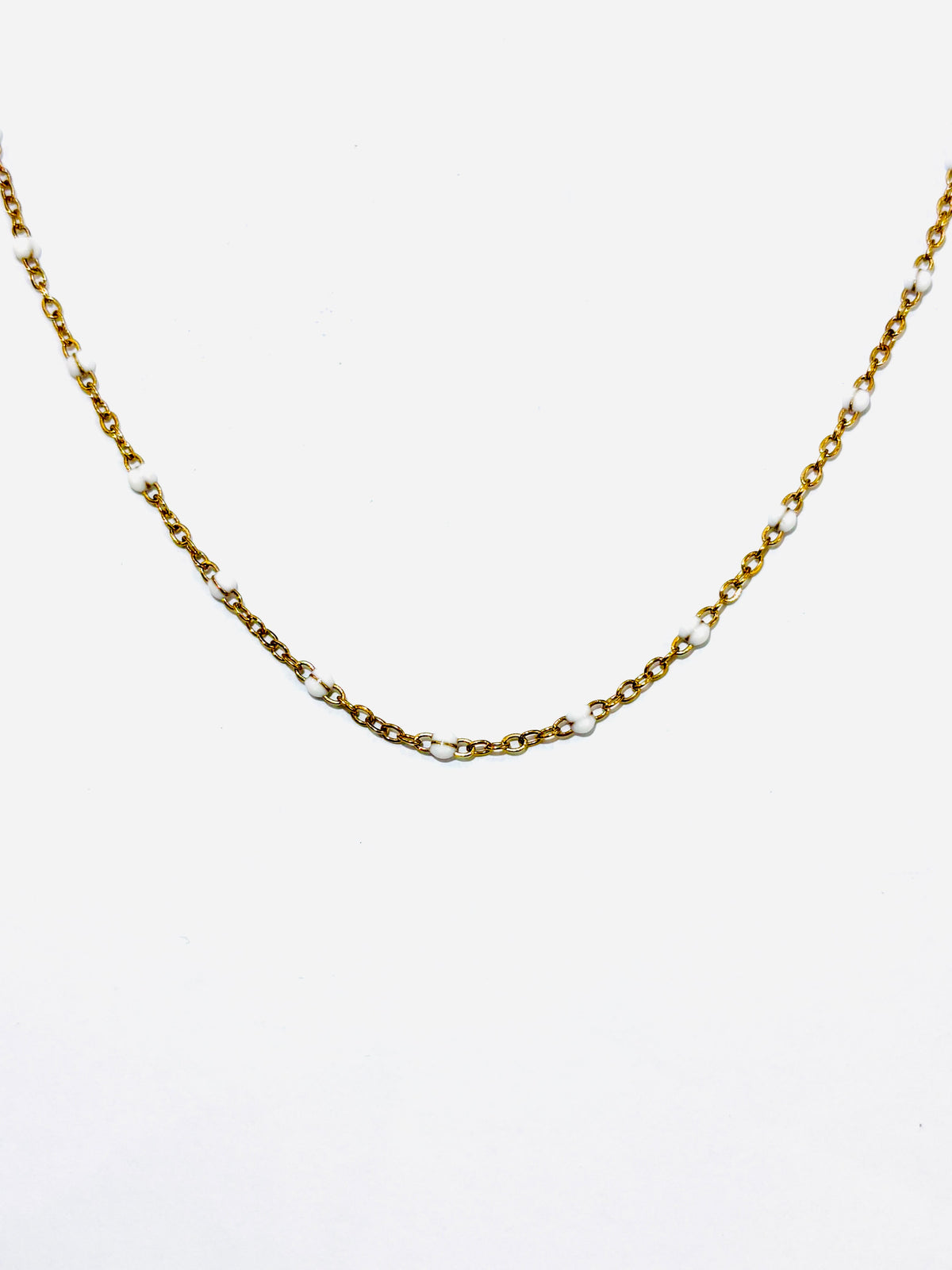 white beaded gold