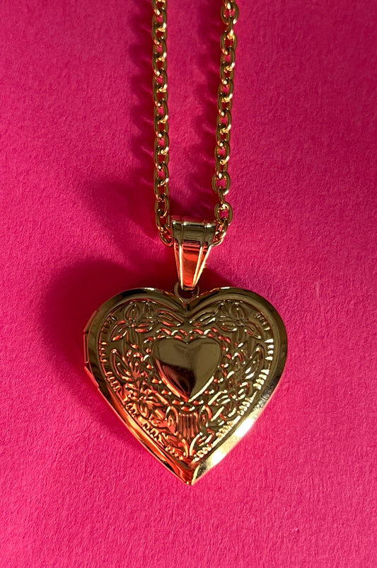 open heart gold pendant