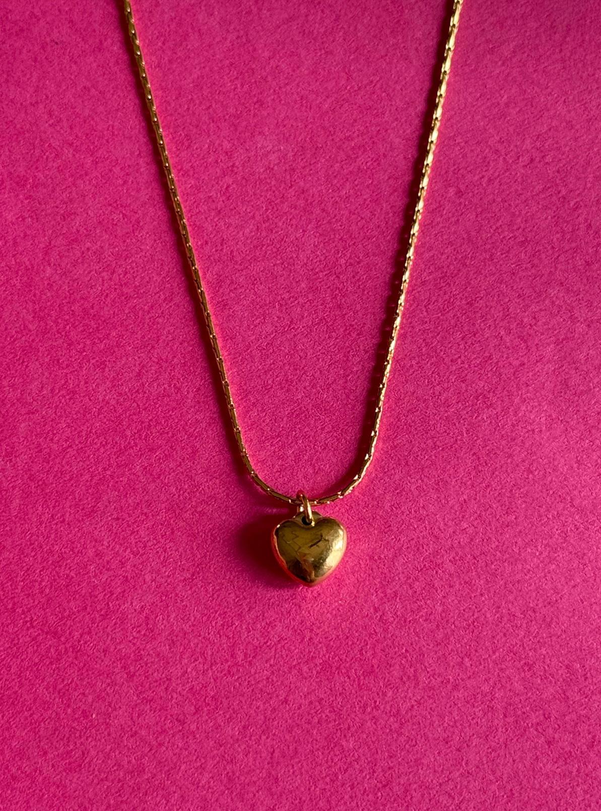 serene gold heart pendant
