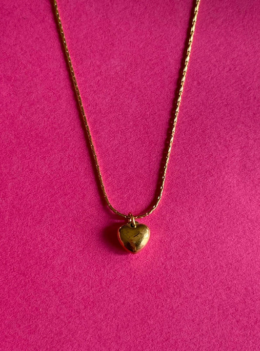 serene gold heart pendant