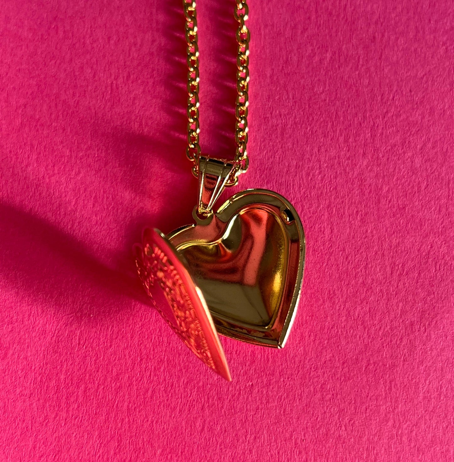 open heart gold pendant