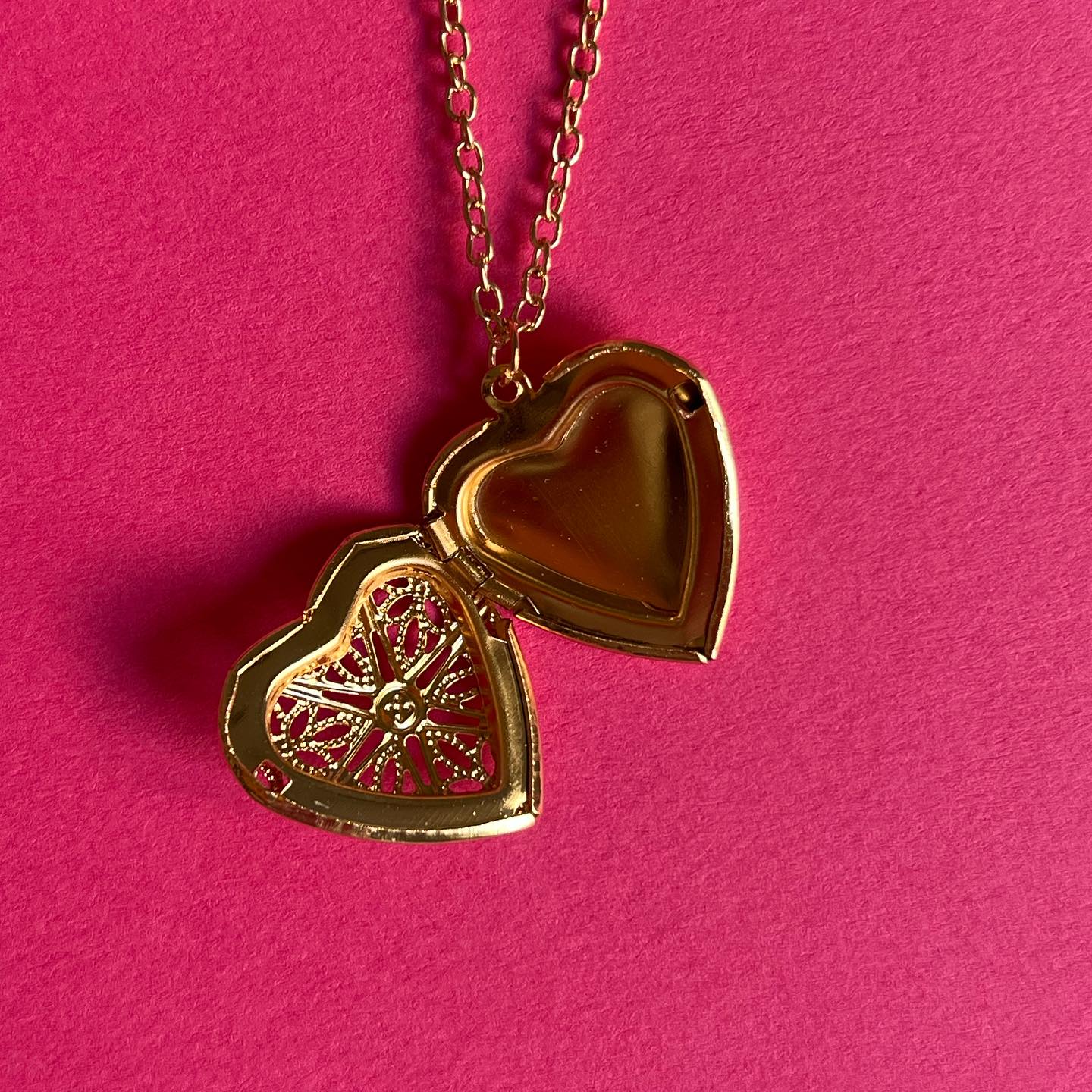 open heart gold pendant