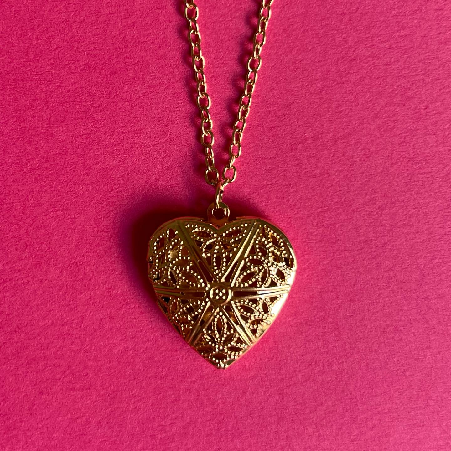 open heart gold pendant
